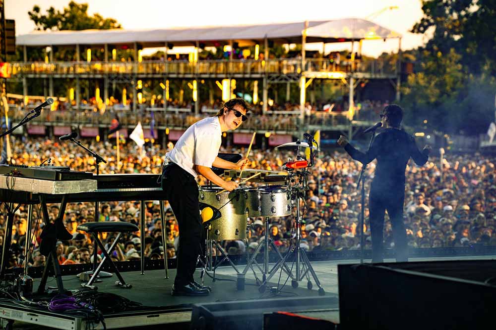 Foster the People performing on stage